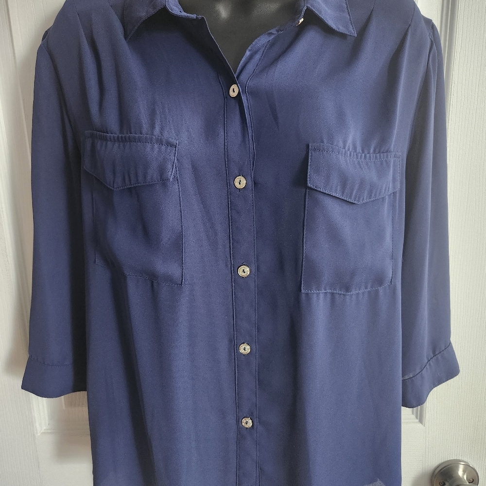 Dusty blue blouse with stylish open back